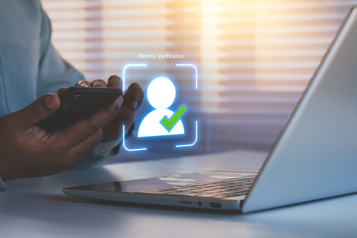 Secure digital CIC director identity verification being completed by accountants using a smartphone with biometric authentication for Companies House compliance